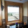 Wauwatosa - Pella Designer Series Wood Window in the Kitchen.